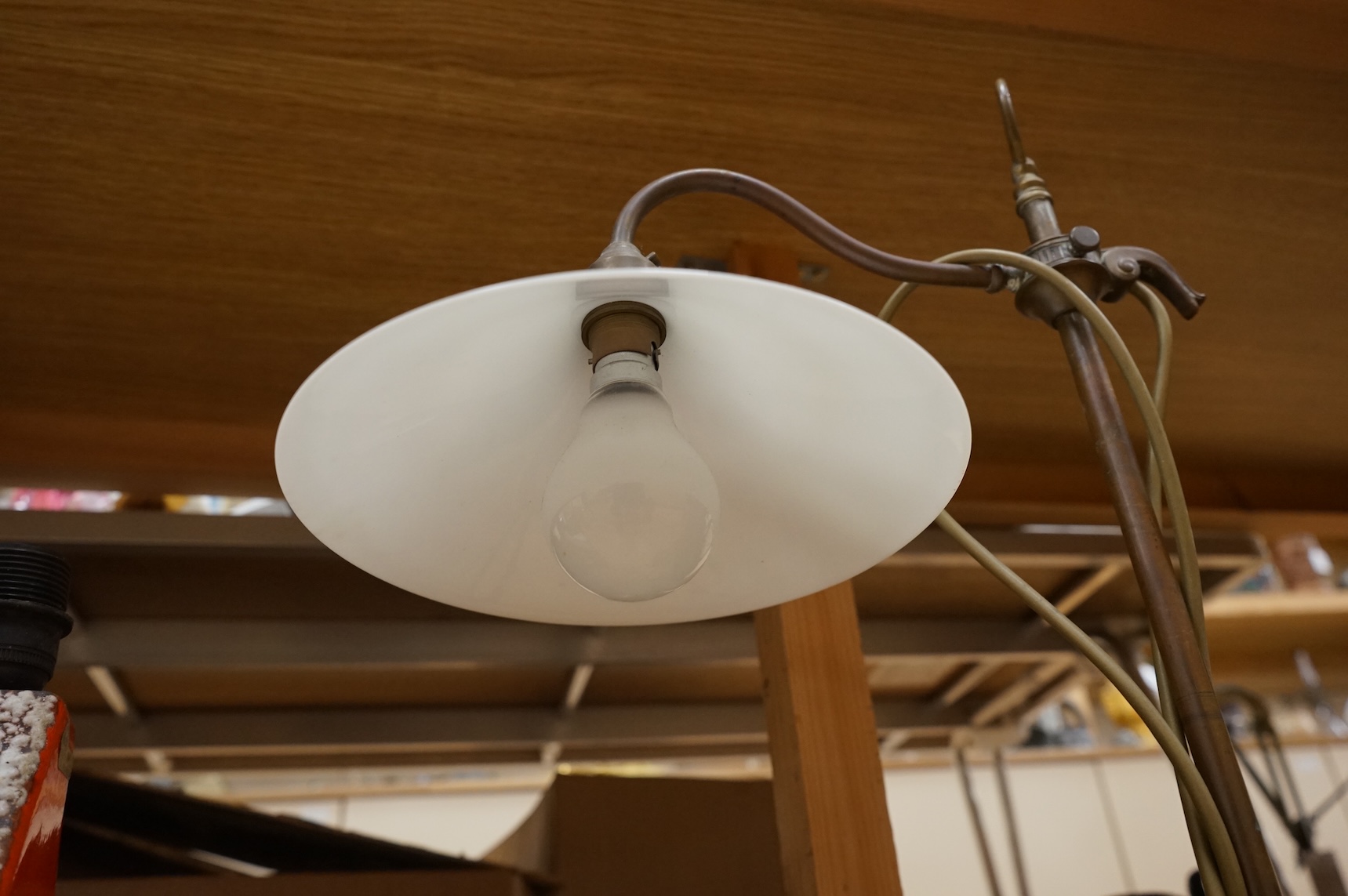 Two lamps comprising a 1960s Herdu ceramic lamp together with a brass and copper adjustable desk lamp, largest 56cm high